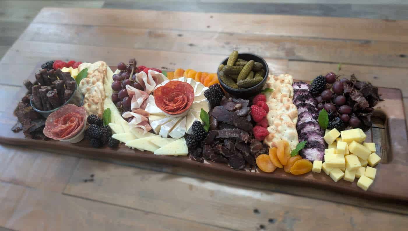 Colorful charcuterie and biltong platter