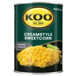 KOO Creamstyle Sweetcorn can with creamy yellow corn and green label packaging.