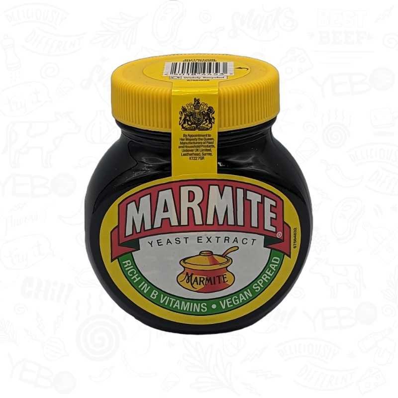 A black jar of marmite spread vegetable extract with a yellow lid