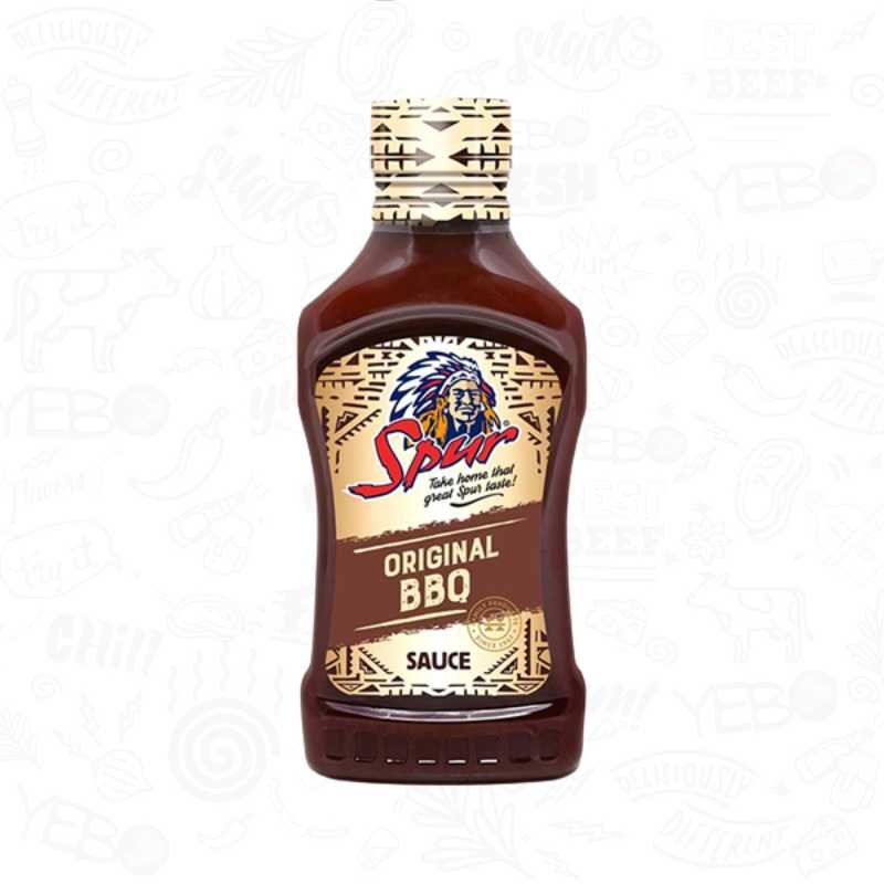 a bottle of spur barbecue sauce